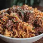 savory beef and noodles crockpot recipe - featured image